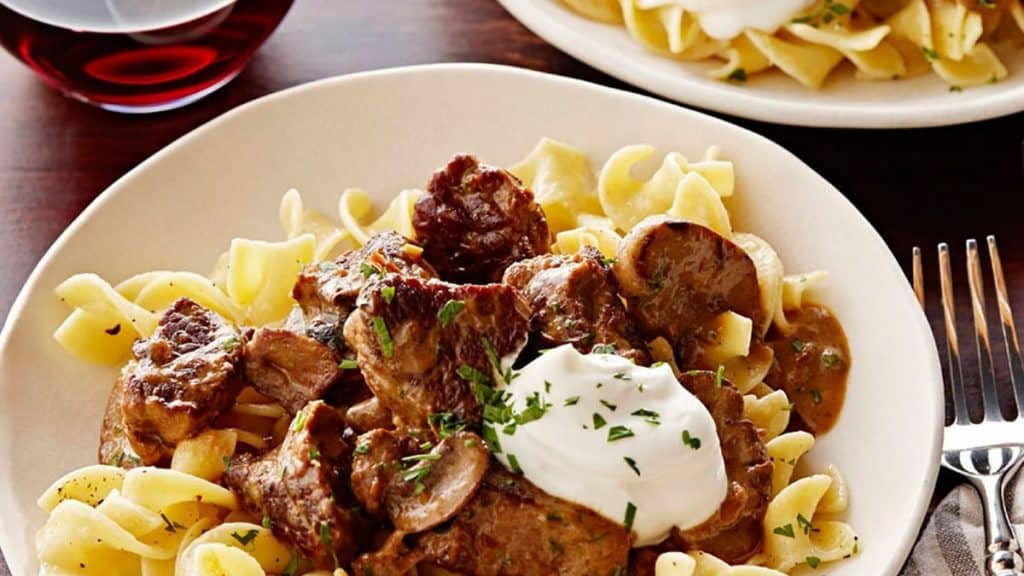 Braised Tips Of Beef Over Noodles