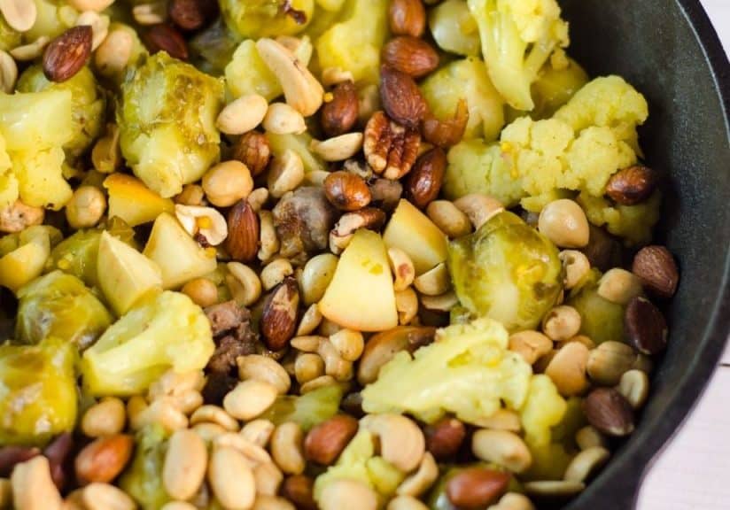 Roasted Cauliflower and Brussels Sprouts with Apple, Nuts, and Sausage