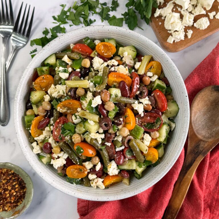 White bowl of Mediterranean Style Five Bean Salad