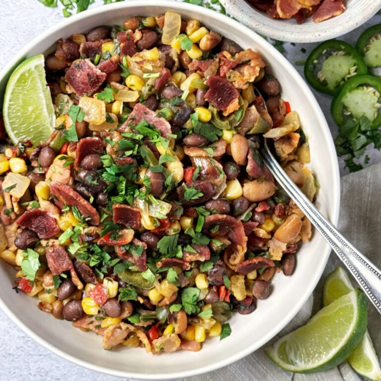 Skillet Cowboy Caviar with Bacon in a white bowl.